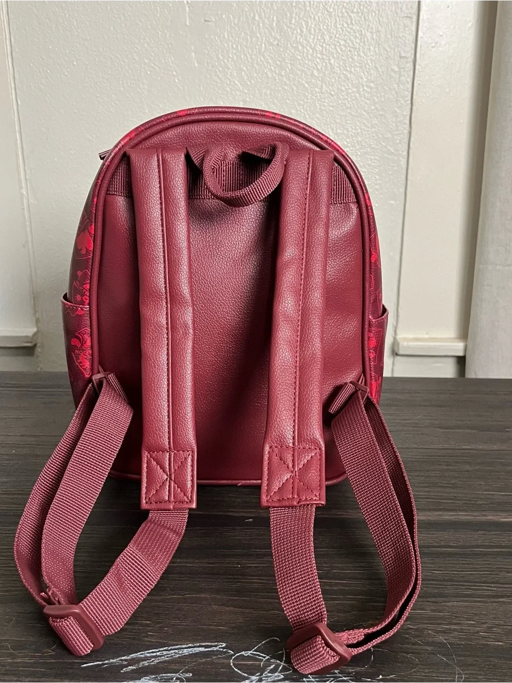 Maroon red faux leather Harry Potter Hogwarts mini backpack ft crest applique